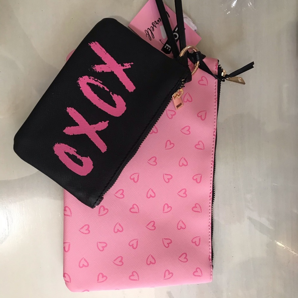 2 XOXO pouch bags